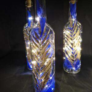 Bouteille led bleu et palme or